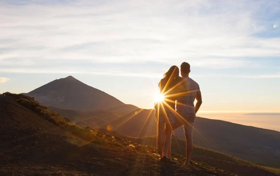 couples enjoying sunset
